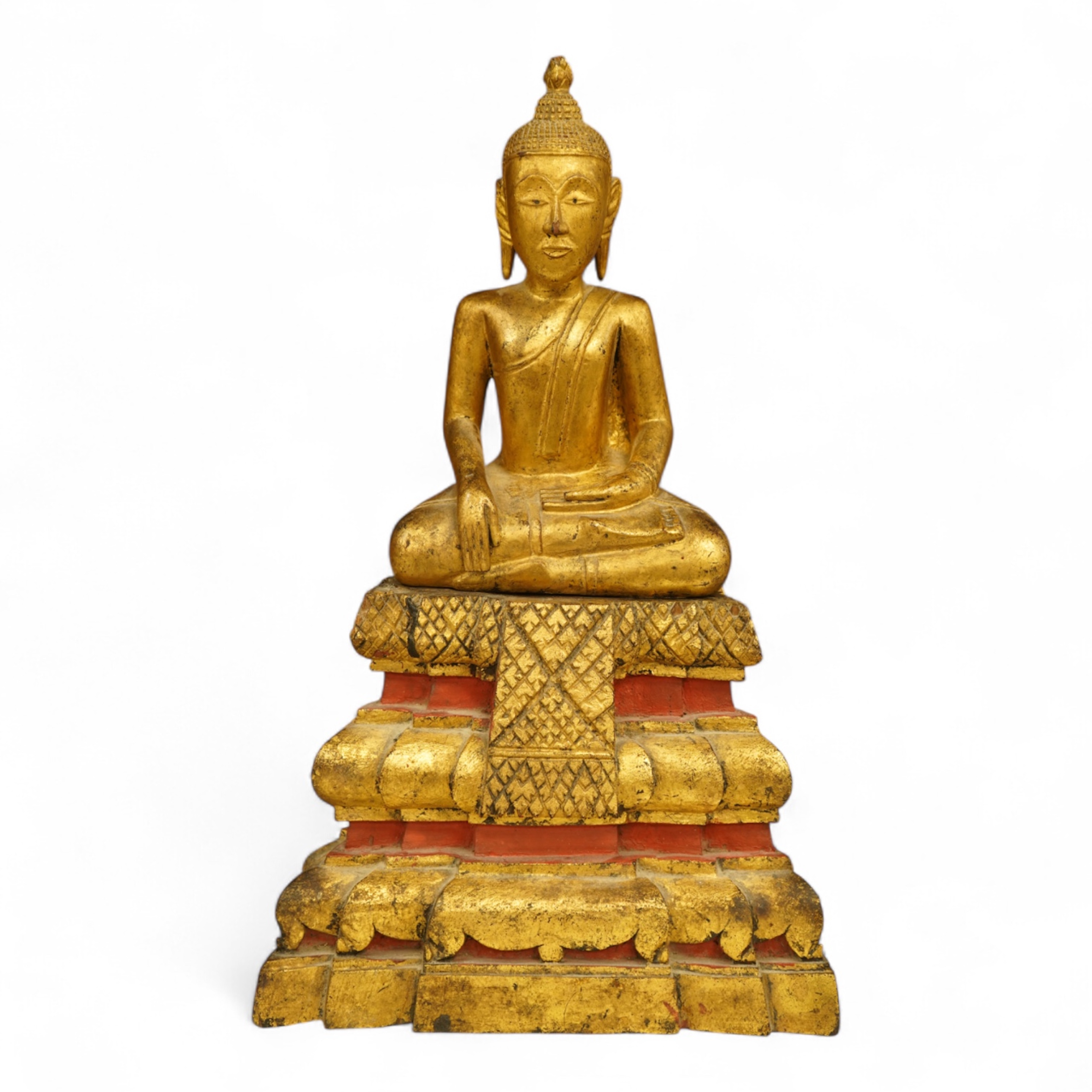 A 19th century Burmese giltwood figure of seated Buddha, 40cm high
